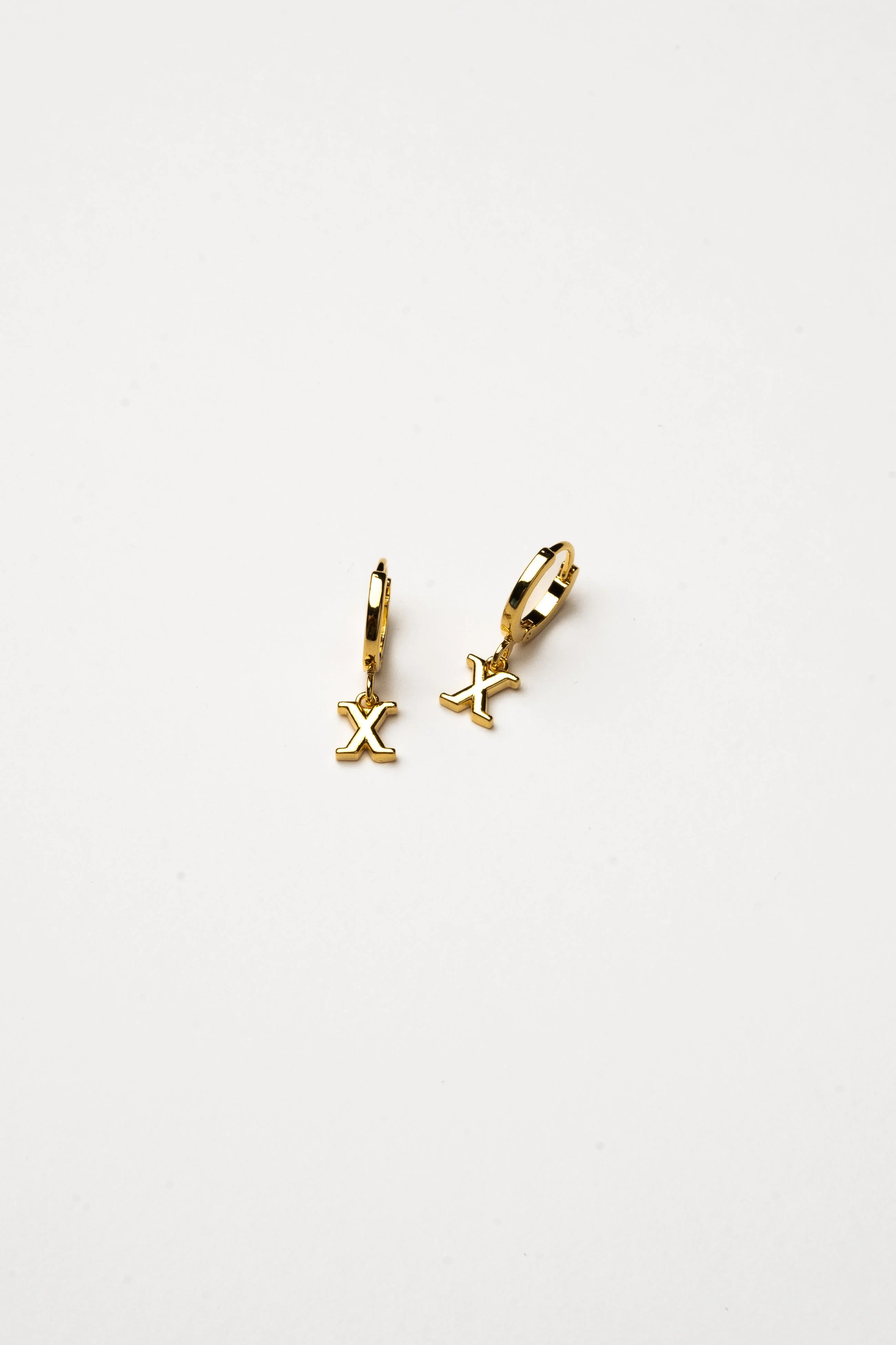 Cove Initial Letter Huggie Earrings - Image 25